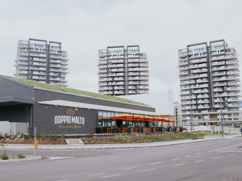Lo store Doppio Malto all'interno del complesso residenziale-commerciale Porta di Mare a Salerno Lo store Doppio Malto all'interno del complesso residenziale-commerciale Porta di Mare a Salerno